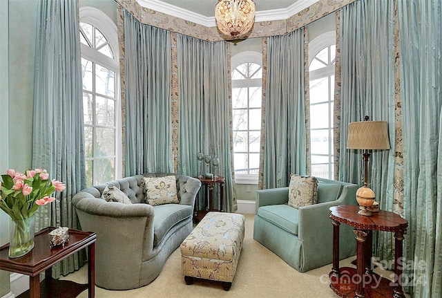 sitting room featuring crown molding