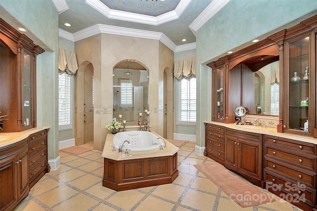 bathroom with crown molding, tile flooring, a tray ceiling, and vanity