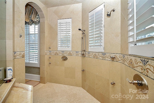 bathroom featuring tiled shower