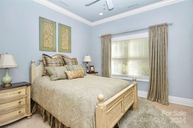 bedroom with ceiling fan and crown molding