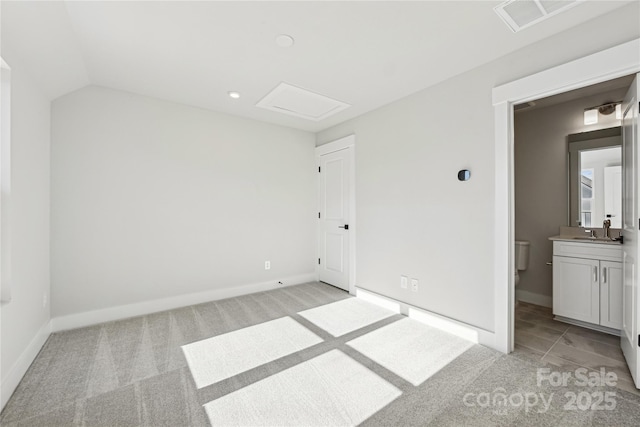 1428 Hamilton St Unit 13, Charlotte, NC 28206 - unfurnished bedroom with visible vents, light colored carpet, attic access, lofted ceiling, and a sink