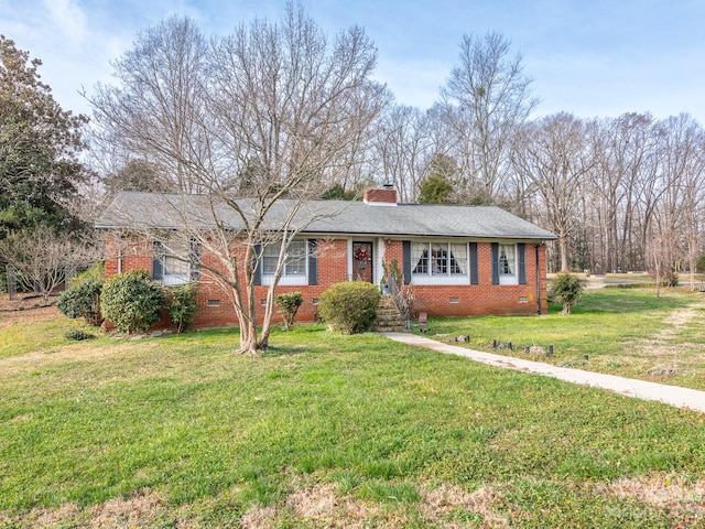 ranch-style house with a front yard