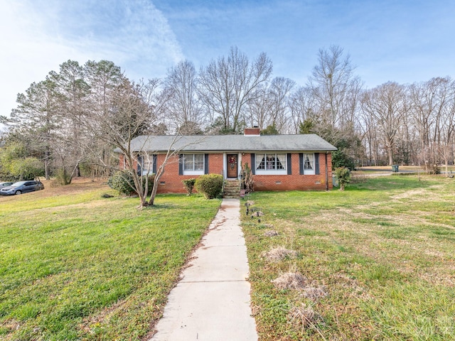 ranch-style house featuring a front lawn