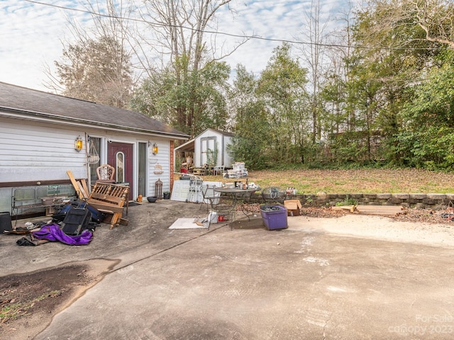 view of patio / terrace with an outdoor structure