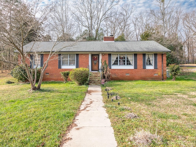 single story home featuring a front lawn