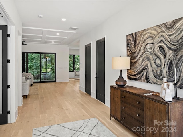 hallway with light wood-type flooring