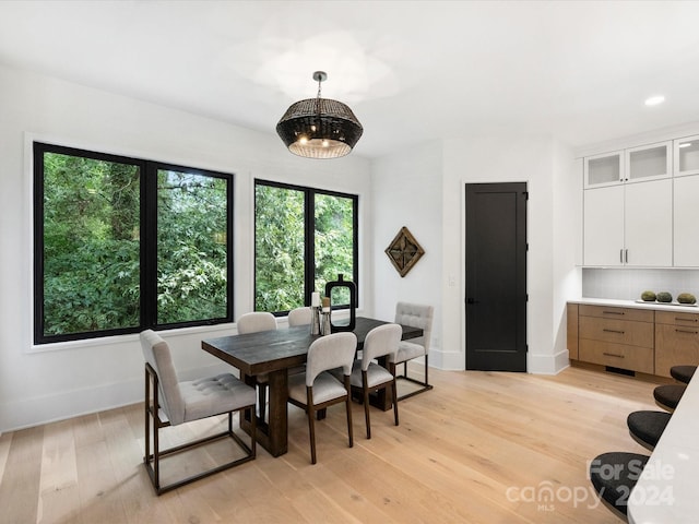 dining space with light wood-type flooring