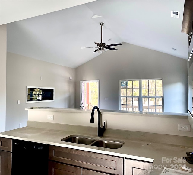 kitchen featuring lofted ceiling, sink, ceiling fan, black dishwasher, and dark brown cabinetry