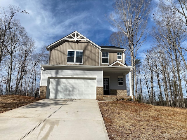 craftsman inspired home with a garage