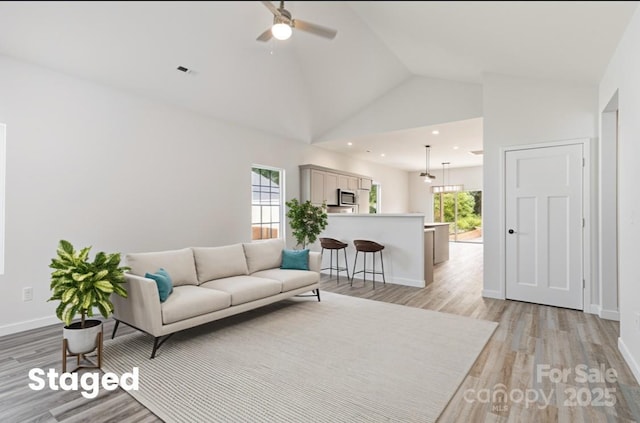213 Sheffield Dr, York, SC 29745 - living area featuring a ceiling fan, light wood-style floors, lofted ceiling, baseboards, and recessed lighting