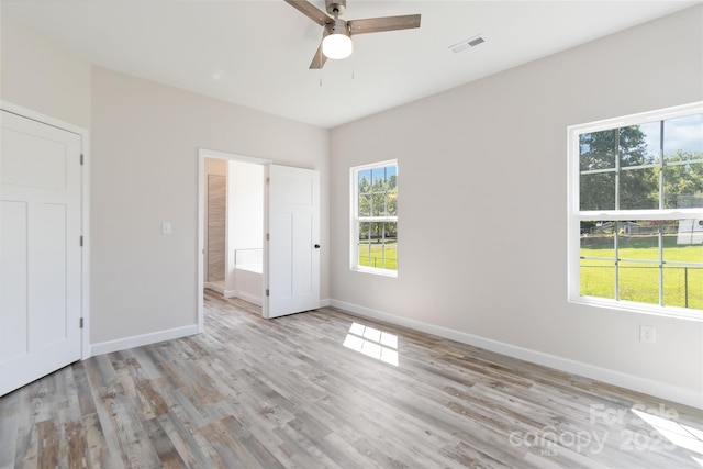 213 Sheffield Dr, York, SC 29745 - unfurnished bedroom with baseboards, wood finished floors, and ceiling fan
