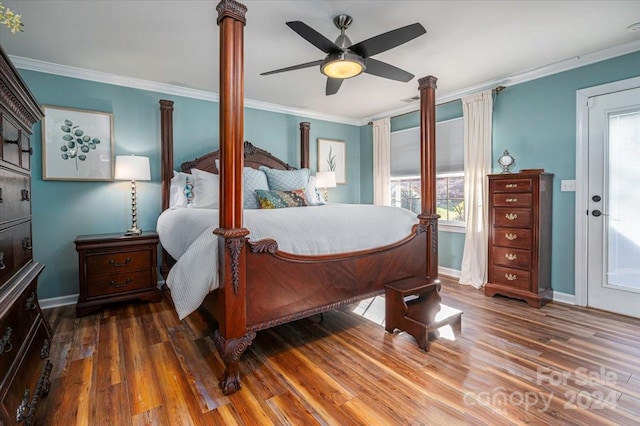 bedroom with ceiling fan, crown molding, and dark hardwood / wood-style floors