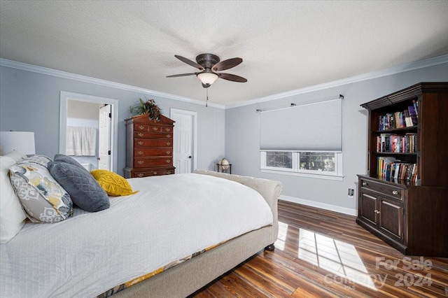 bedroom with ceiling fan, ornamental molding, and dark hardwood / wood-style floors