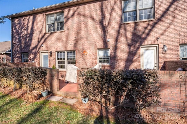 rear view of house featuring a patio area