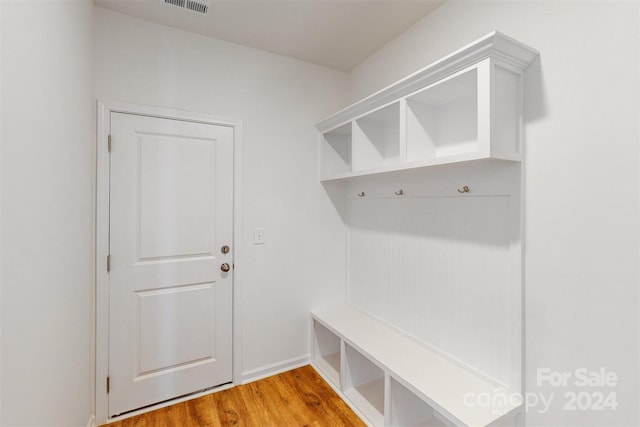 mudroom with hardwood / wood-style floors