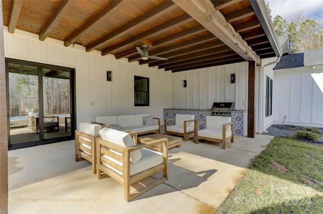 view of terrace with area for grilling, outdoor lounge area, ceiling fan, and exterior kitchen