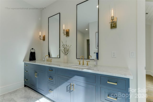 bathroom with tile floors and dual bowl vanity