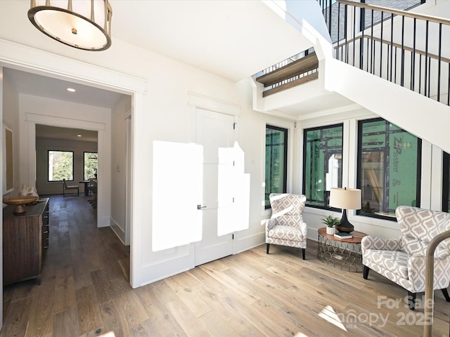 sitting room featuring wood-type flooring