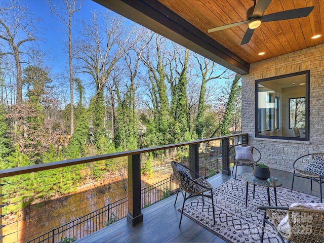 balcony featuring ceiling fan