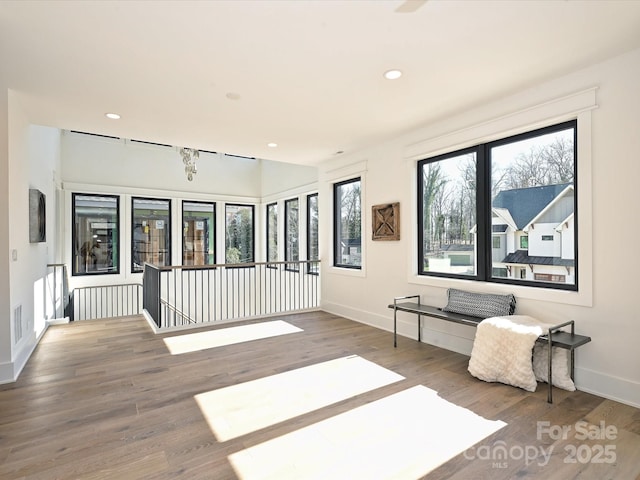 interior space with hardwood / wood-style floors