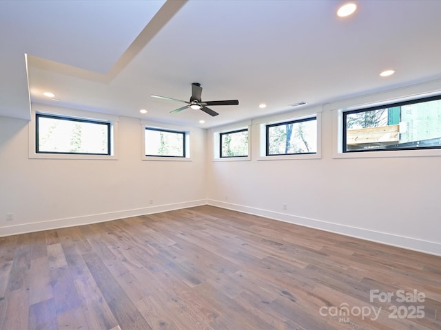 spare room featuring ceiling fan and wood-type flooring