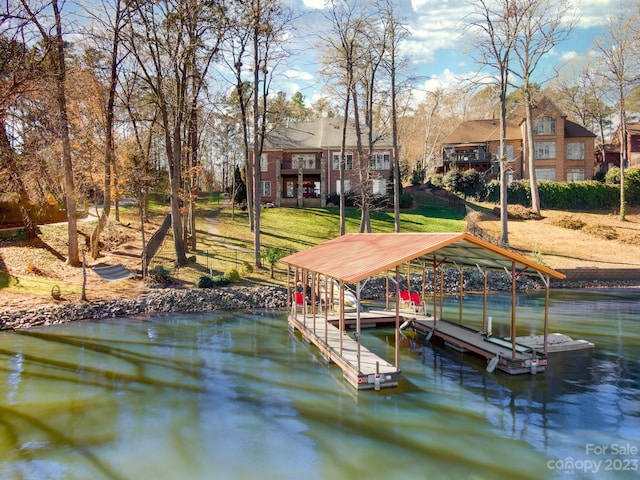 dock area with a water view