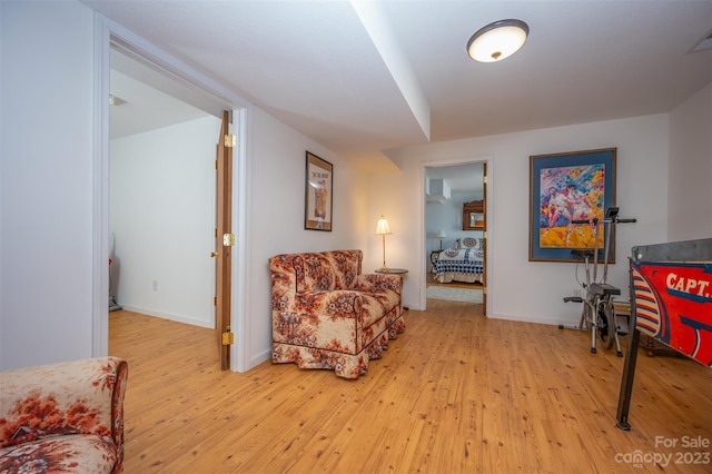 living area with light hardwood / wood-style floors