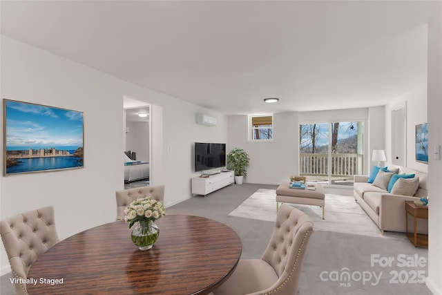 living room with light colored carpet and an AC wall unit