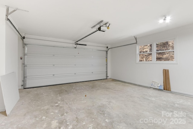 garage featuring a garage door opener