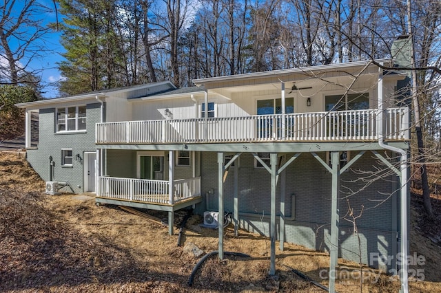 back of house featuring ceiling fan