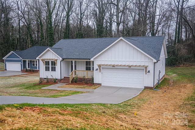 ranch-style home featuring a garage