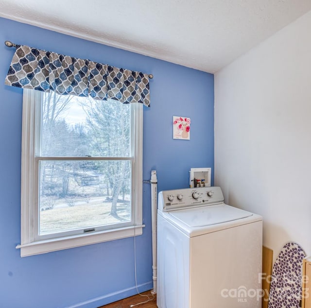 clothes washing area featuring washer / clothes dryer