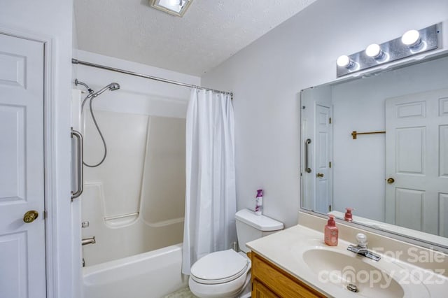 full bathroom with vanity, a textured ceiling, shower / bath combo with shower curtain, and toilet