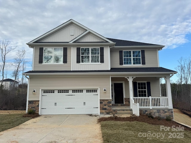 craftsman-style home featuring a garage and a porch