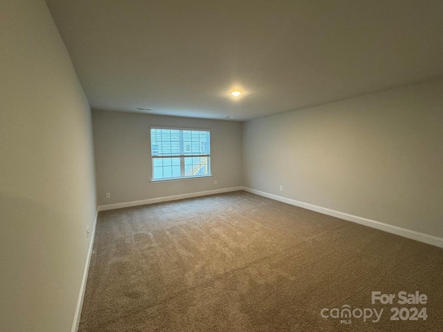 view of carpeted spare room