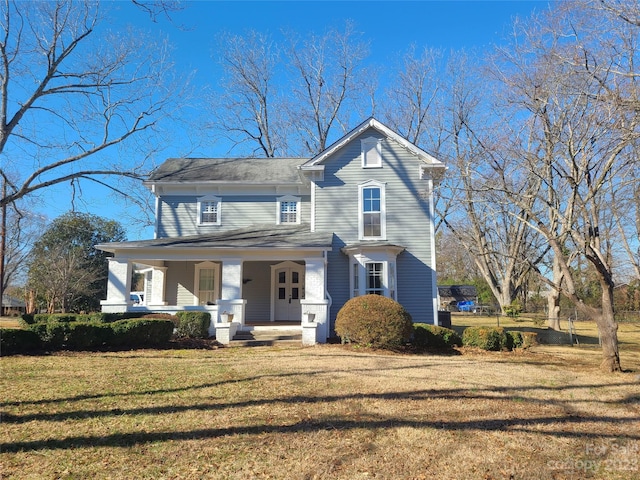 view of front of home featuring a porch and a front yard