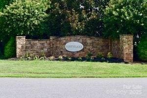 community sign with a lawn