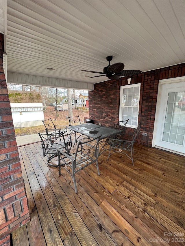 wooden deck with ceiling fan