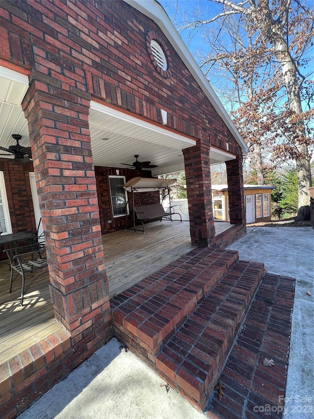 view of patio featuring ceiling fan