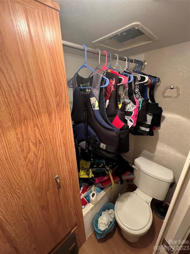 walk in closet featuring hardwood / wood-style flooring