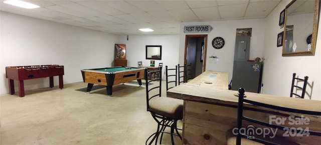 recreation room featuring electric panel, pool table, and a paneled ceiling