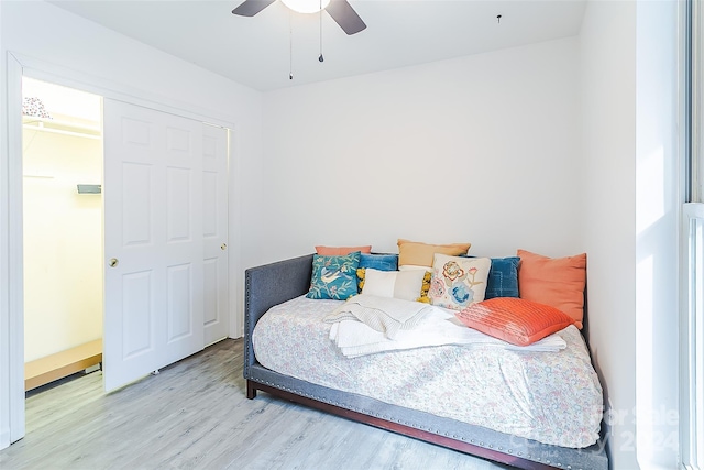 bedroom featuring light hardwood / wood-style flooring and ceiling fan