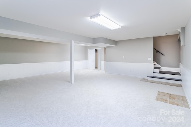 basement with light carpet