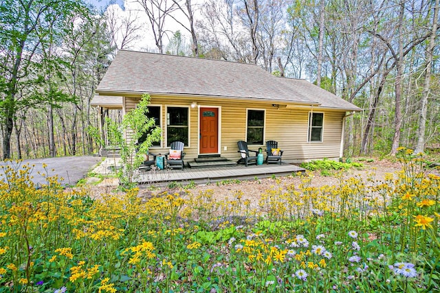 rear view of property with a deck