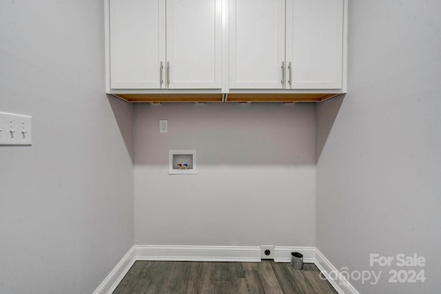 laundry area with cabinets, dark hardwood / wood-style flooring, and hookup for a washing machine