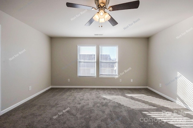 carpeted empty room with ceiling fan