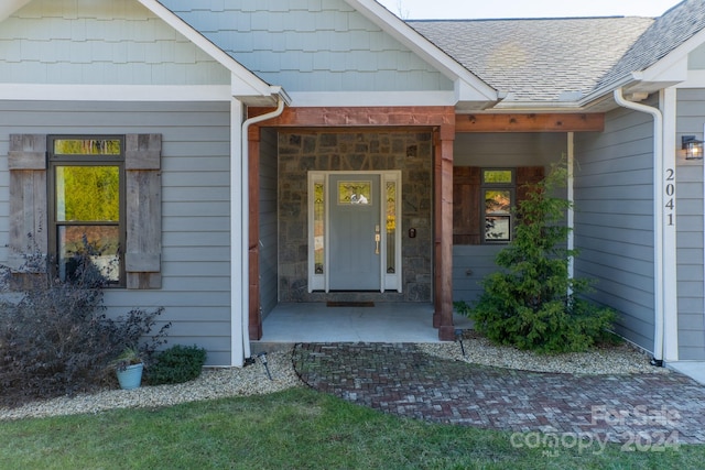 property entrance featuring covered porch