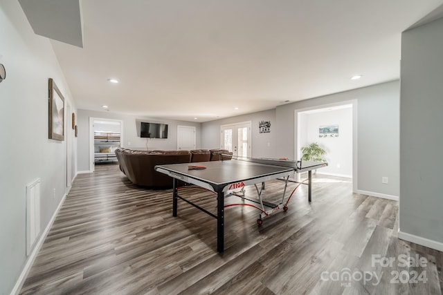 playroom with dark hardwood / wood-style flooring