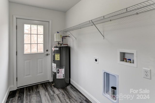 clothes washing area featuring dark wood-type flooring, hookup for a washing machine, electric water heater, and electric dryer hookup