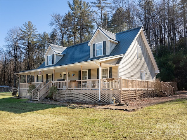 view of front of home featuring a front yard and covered porch